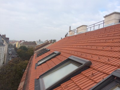 Neuherstellung Dacheindeckung inkl. VELUX-Dachfenster Einbau